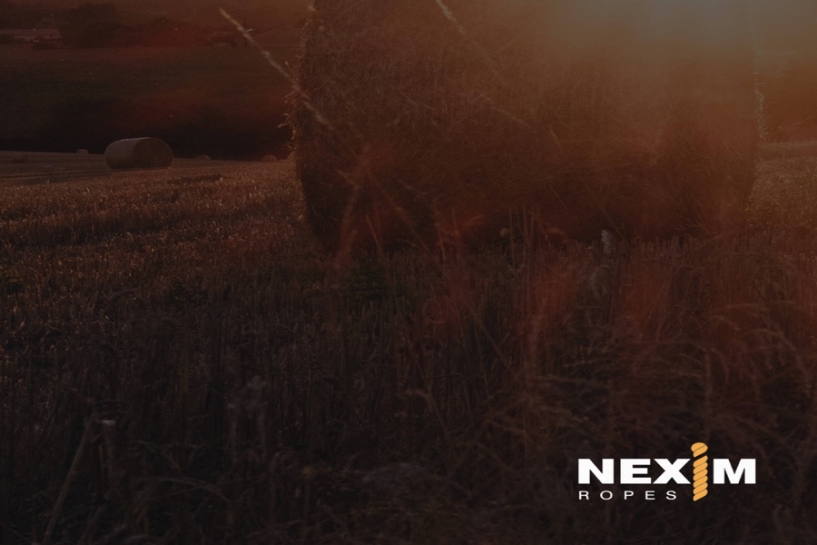 Nexim Ropes — hay field at sunset with the Nexim Ropes logo